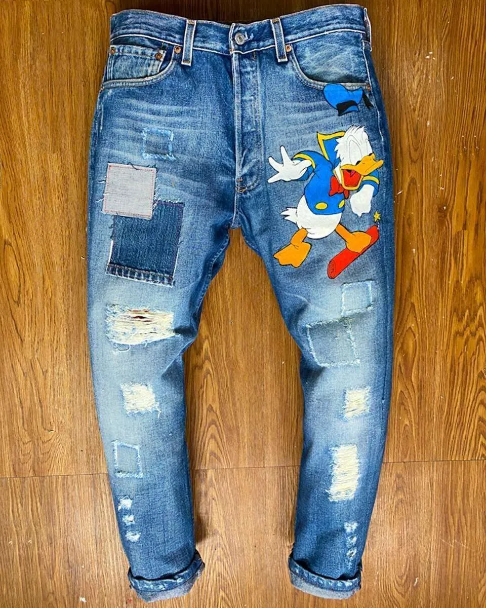 Levi’s Vintage Paperino 2020 jeans dipinti a mano cartoon