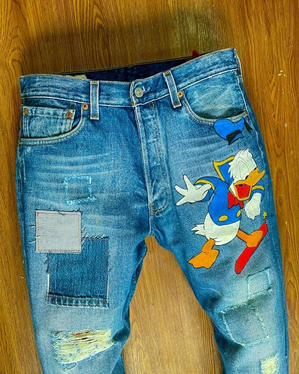 Levi’s Vintage Paperino 2020 jeans dipinti a mano cartoon