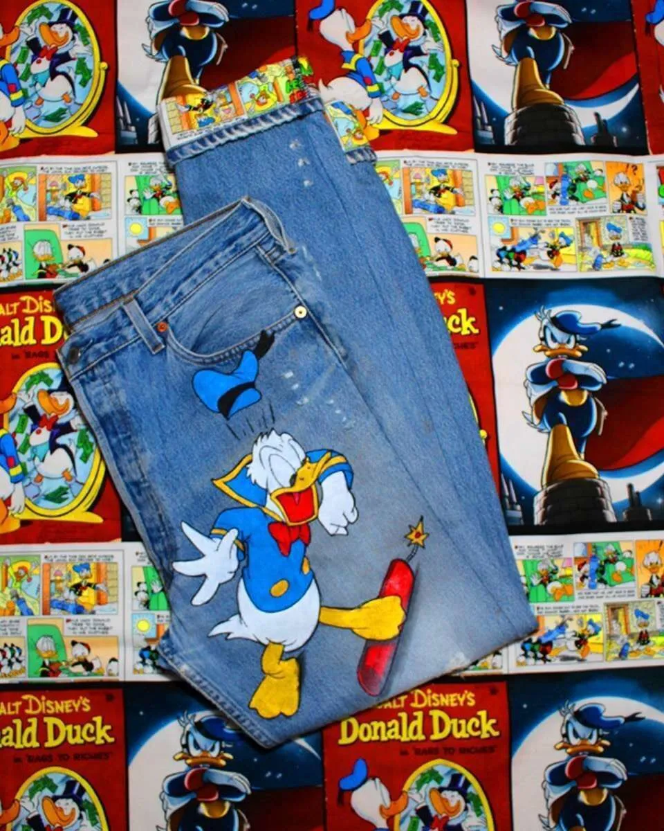 Never Say Never Levi's Vintage Paperino jeans dipinti fumetto