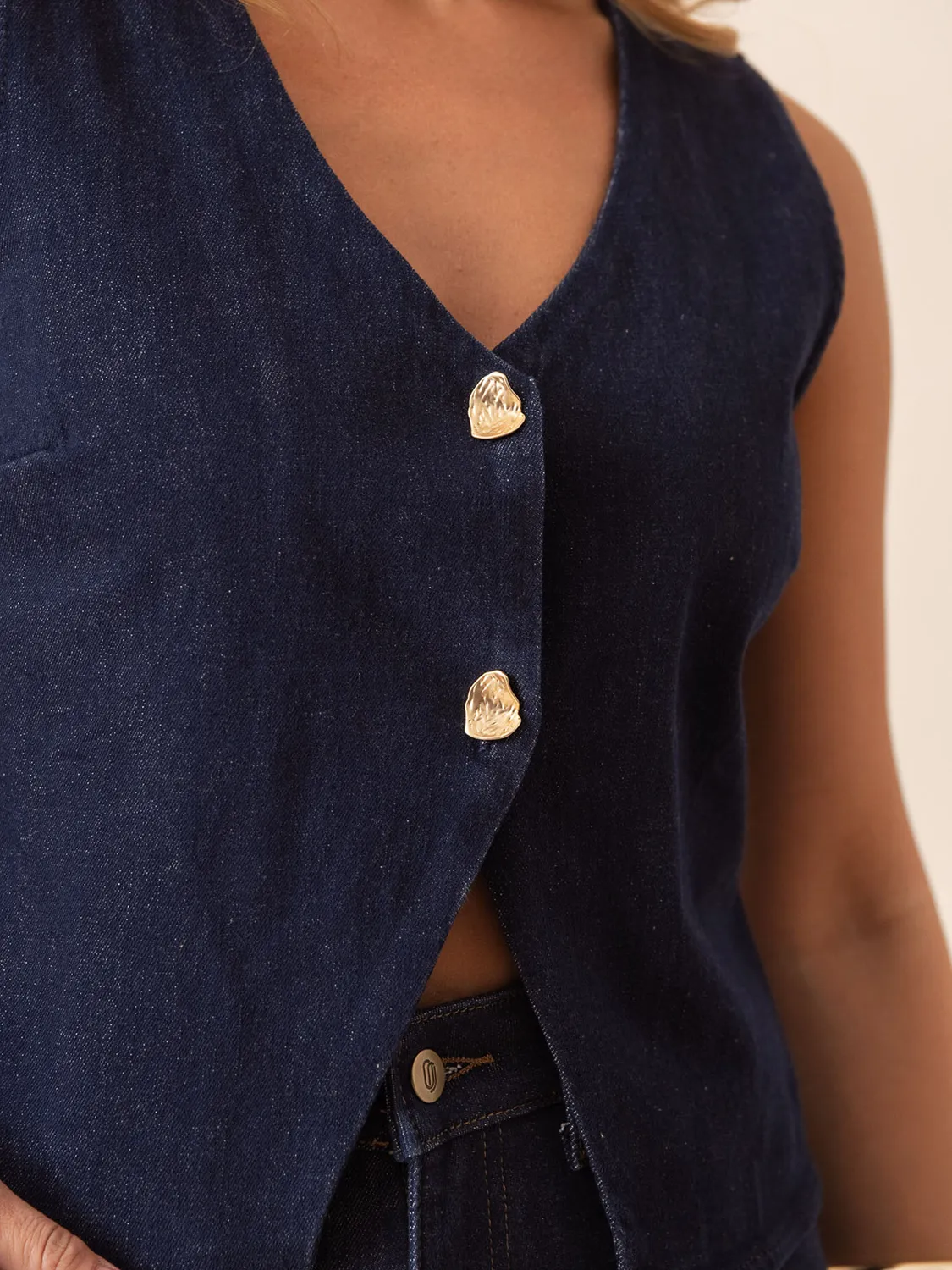 Oraije Théonie giacca denim grezza bottoni oro