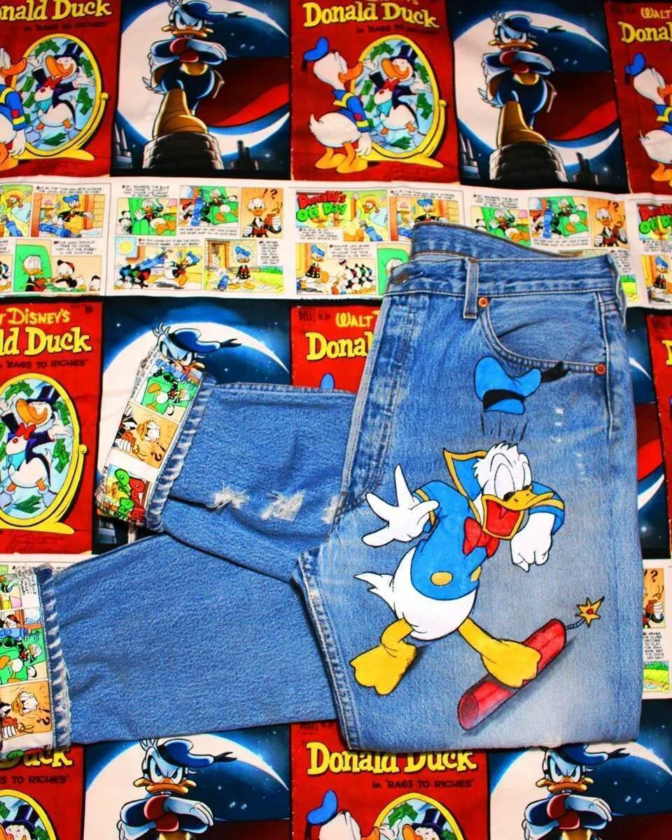 Never Say Never Levi's Vintage Paperino jeans dipinti fumetto