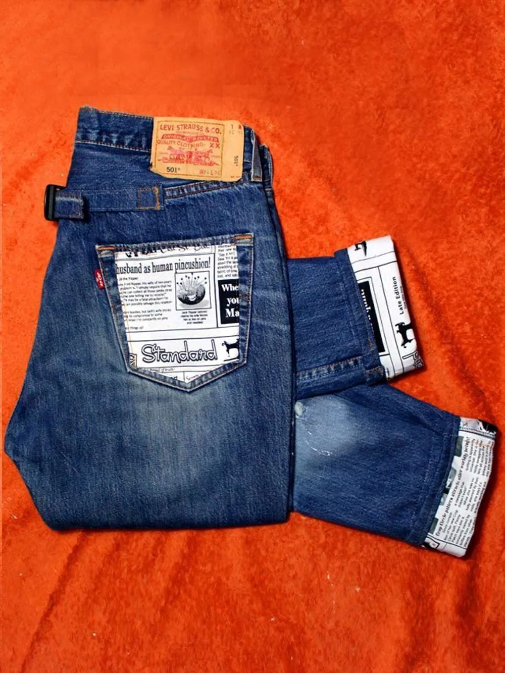 Never Say Never Levi's Vintage Giornale jeans tessuto papers